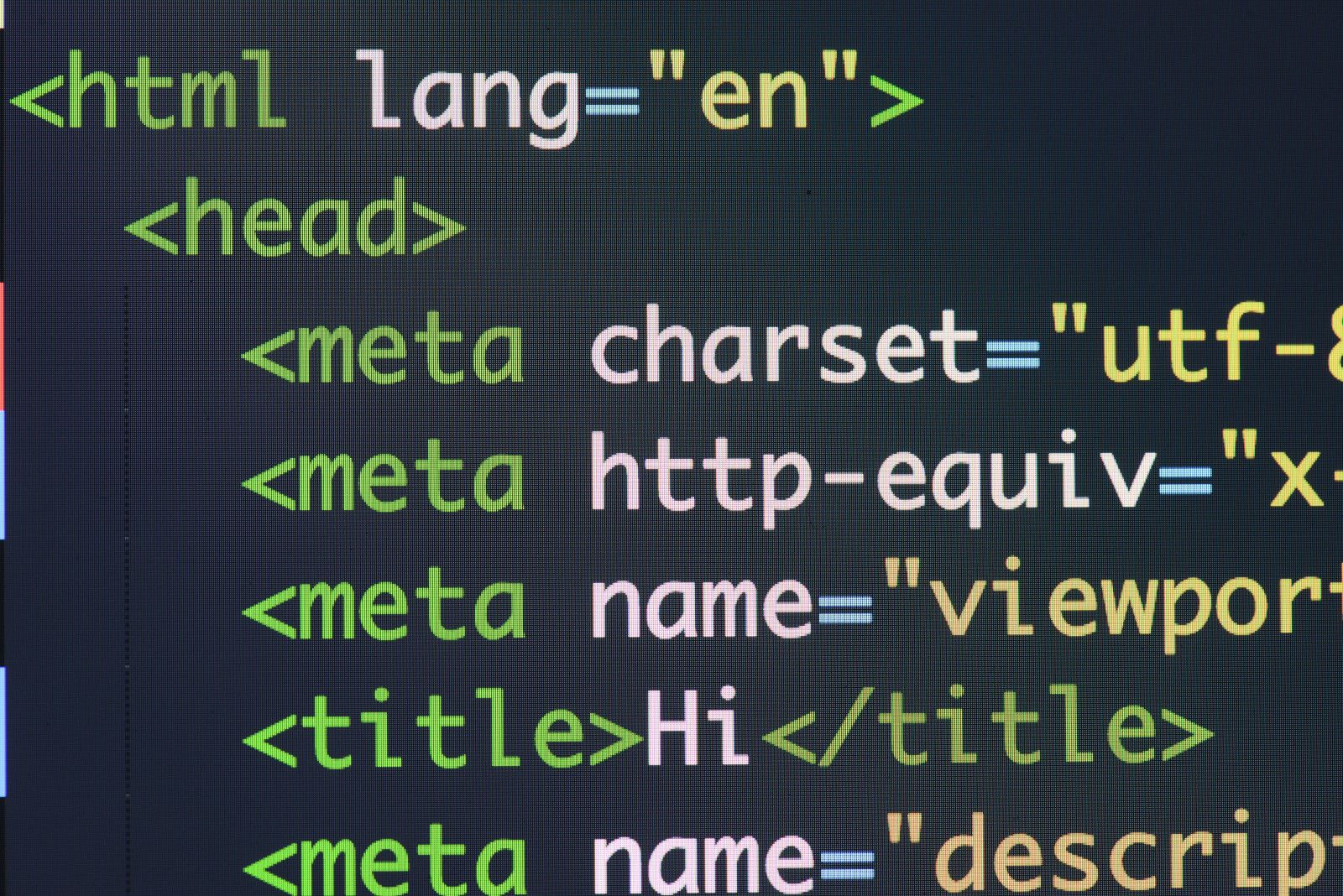 HTML email template code displayed on a screen