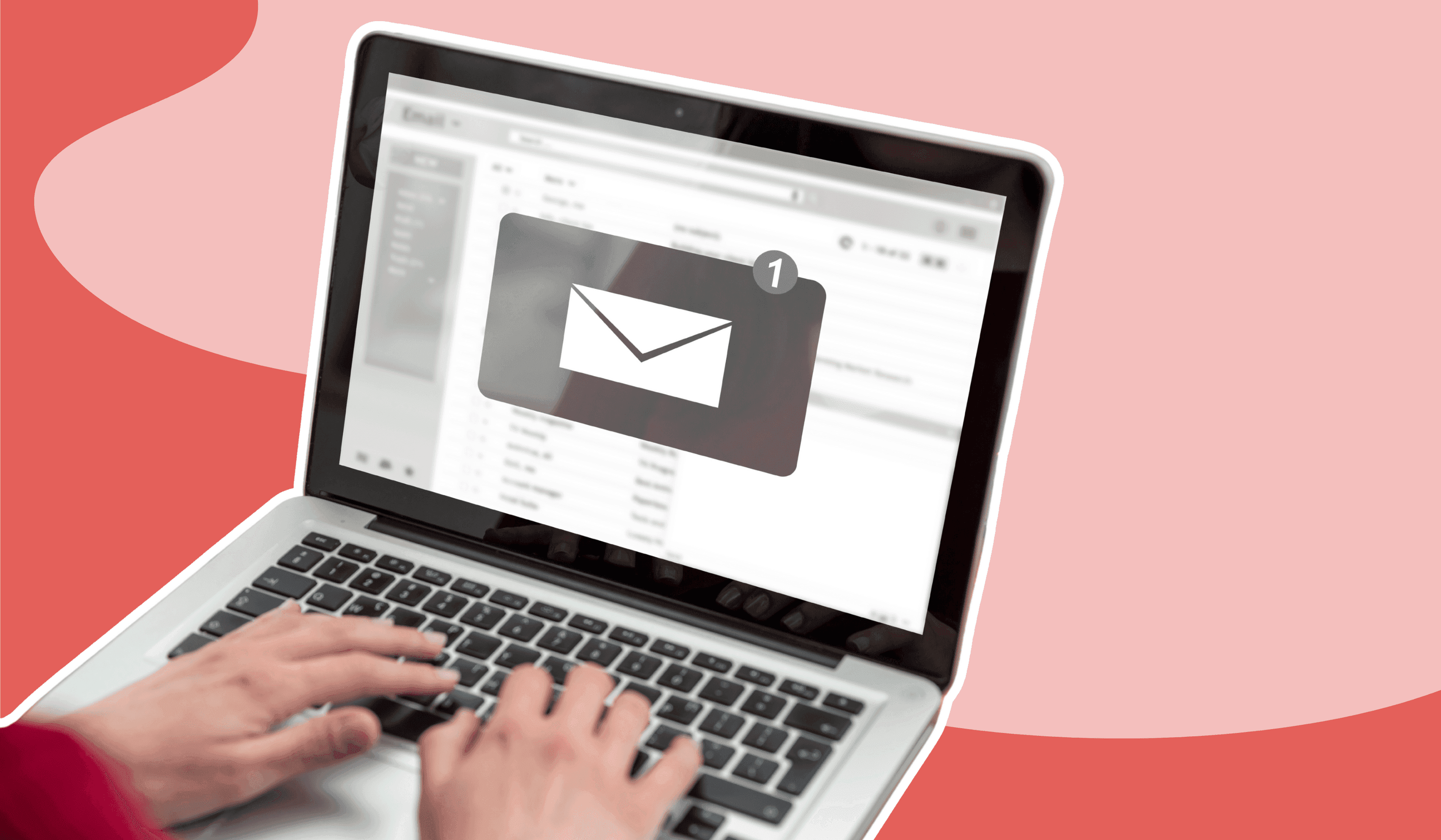 Person typing on a laptop with an email notification popup
