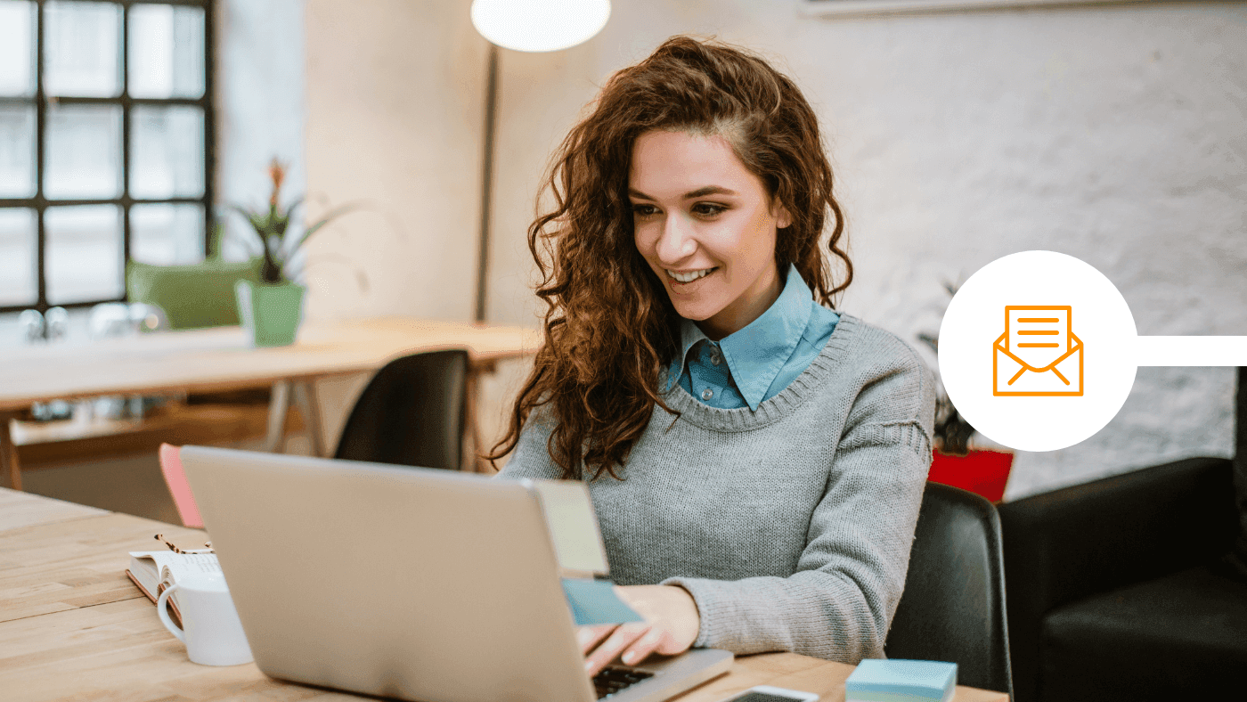 Professional reviewing email deliverability best practices on a laptop