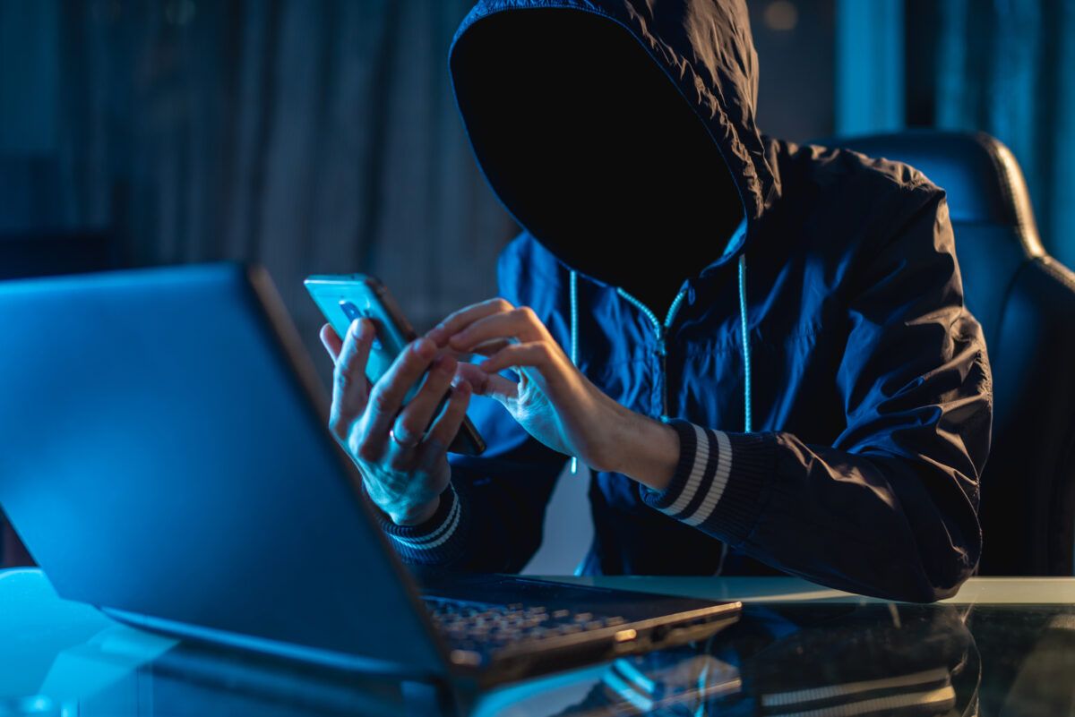 Attacker researching a target before launching a spear phishing attack