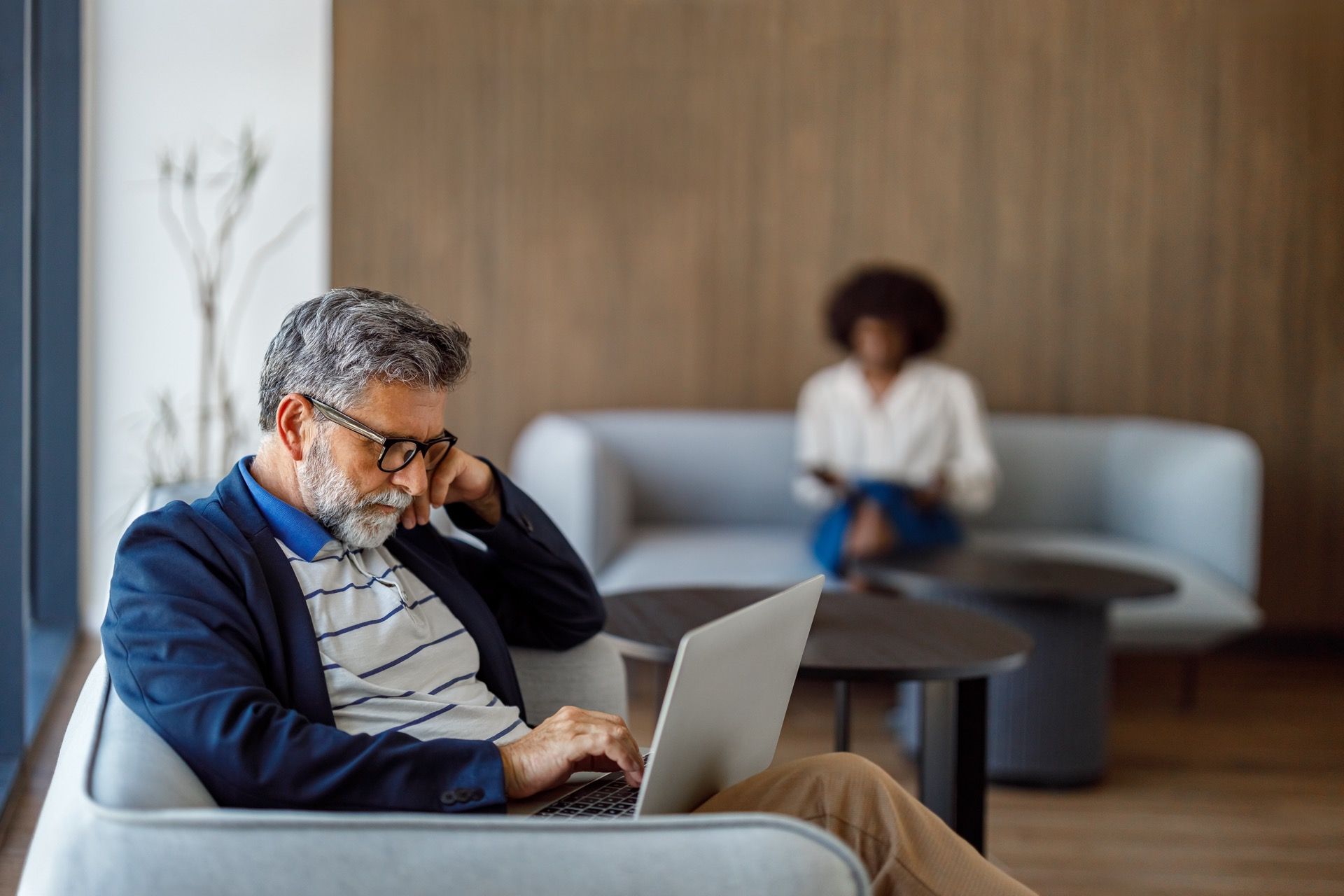 Employee reading a convincing personalized email on a laptop